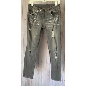 dELiA*s gray, paint splatter skinny jeans